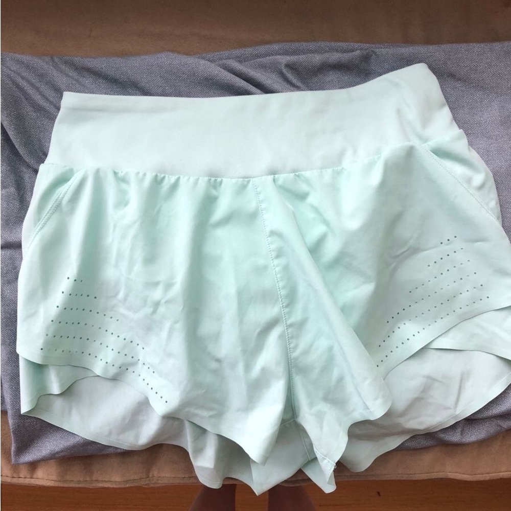 Mint green running shorts